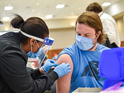 COVID-19 Vaccine being administered